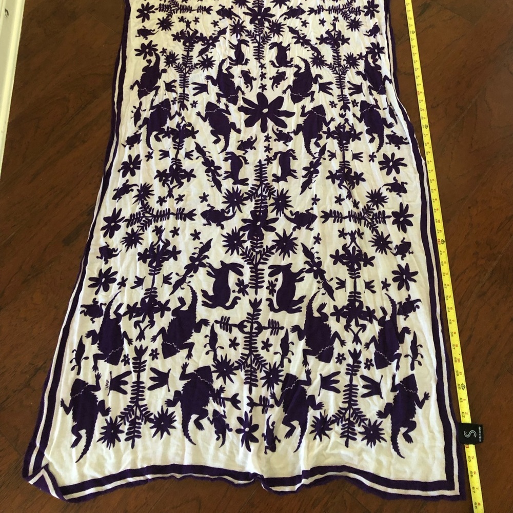 Purple and white. TCU scarf  new without tags.